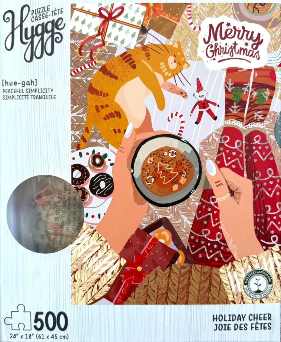 First-person view of hands holding a mug of cocoa, with a cat, gifts, and patterned leggings in a cozy Christmas scene.