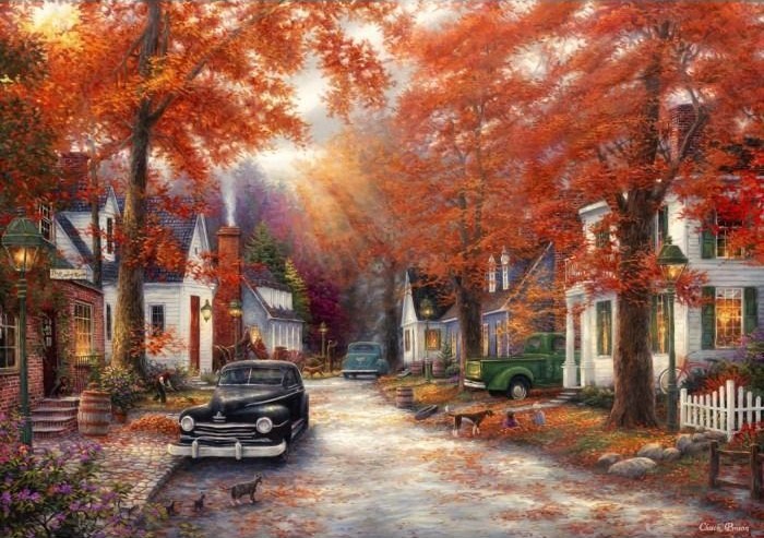 A peaceful autumn village scene with old cars, colorful trees, and houses.