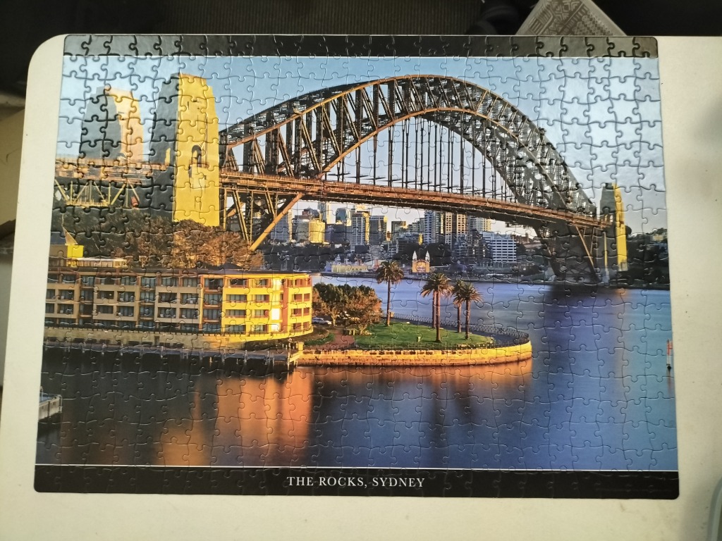 Sydney Harbour Bridge and The Rocks waterfront at sunset