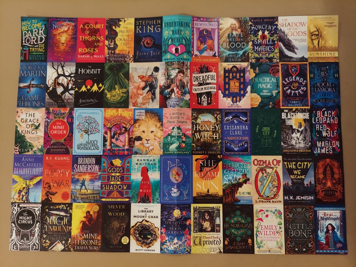 A collage of various fantasy book covers arranged in a grid pattern.