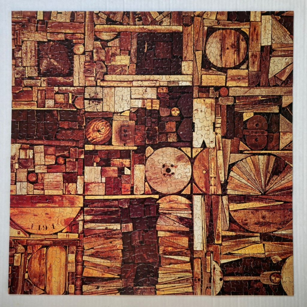 Abstract mosaic composition of various wooden textures and geometric shapes in shades of brown.