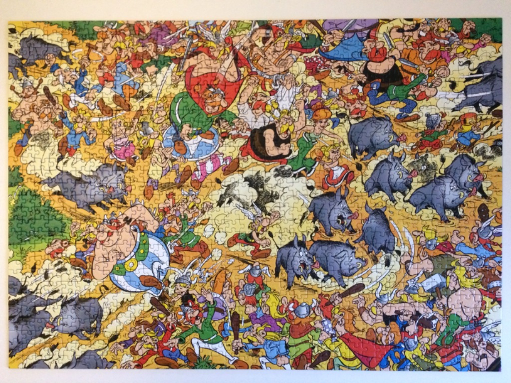 A crowded comic illustration of a chaotic battle featuring Asterix and Obelix amidst a herd of wild boars.