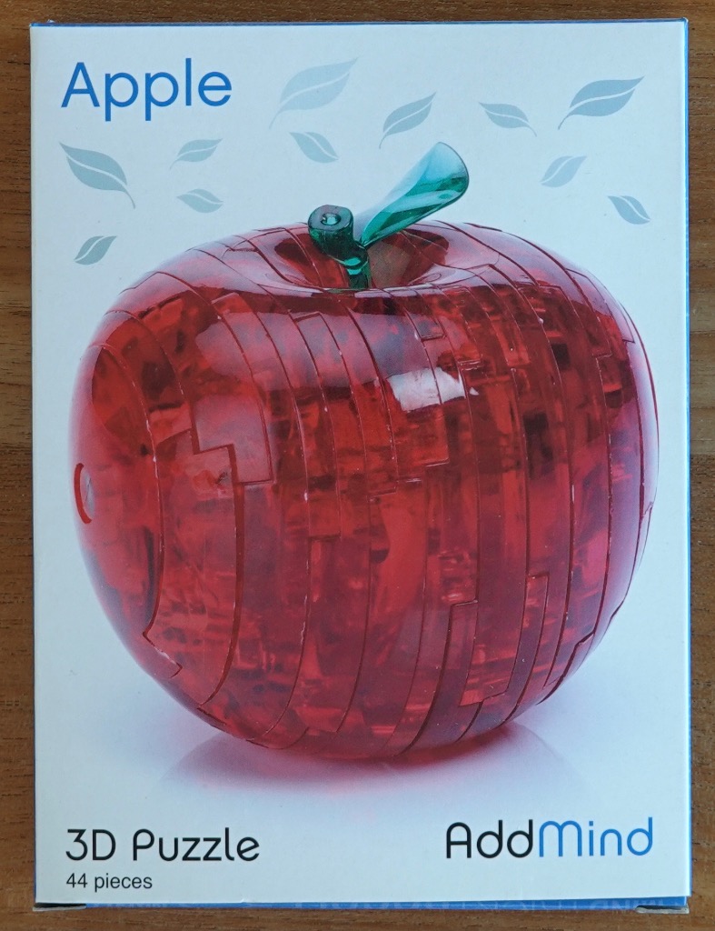 A translucent red apple-shaped 3D object with a green stem against a white background.