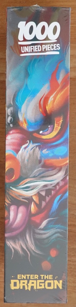 A close-up illustration of a colorful, stylized dragon face with vibrant blue, orange, and red tones.
