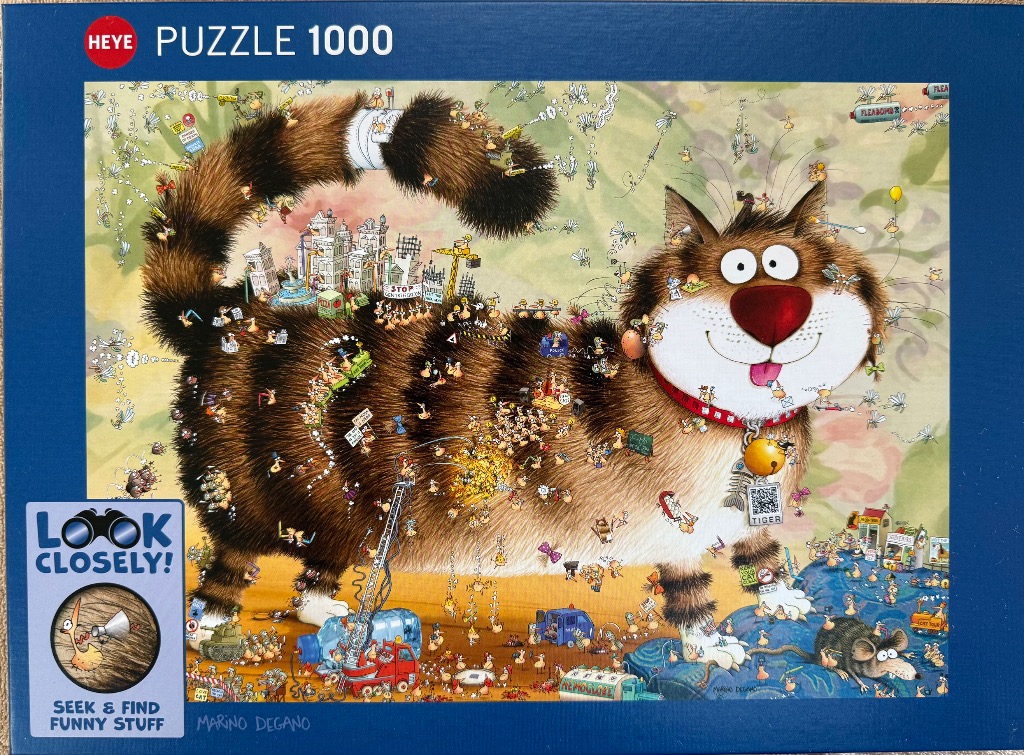 Cartoon illustration of a large, friendly tabby cat populated by tiny chaotic figures and miniature scenes.