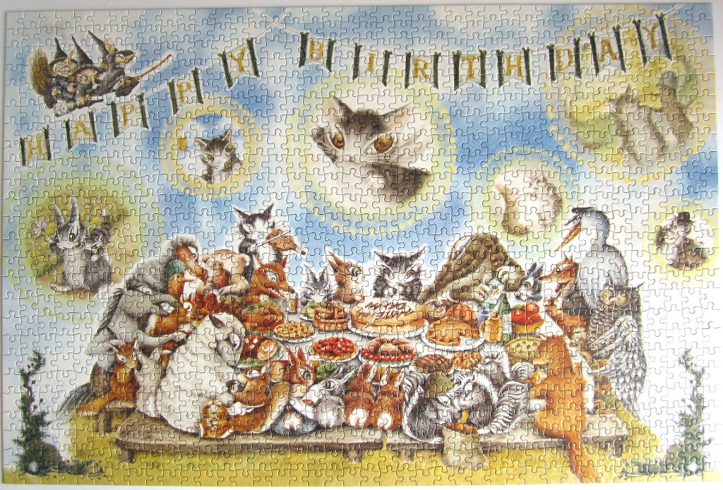 Whimsical illustration of forest animals gathering around a birthday banquet table with a banner above.