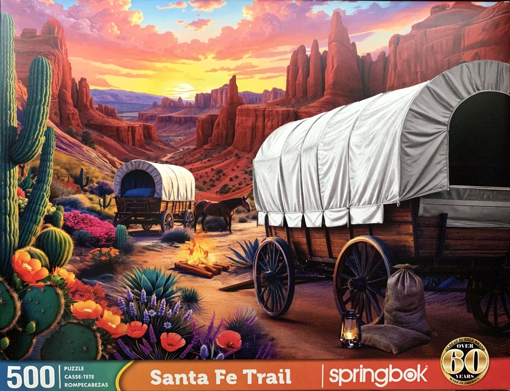 A digital painting of two covered wagons at sunset in a southwestern desert landscape with cacti and mesas.