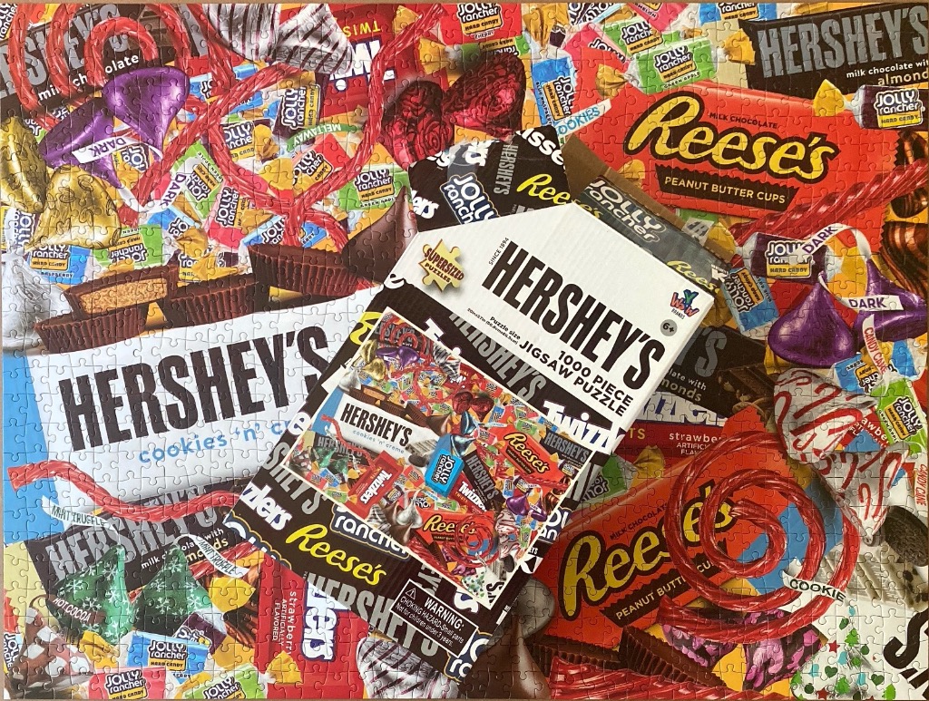 A collage of popular candy brands and wrapped sweets including Hershey