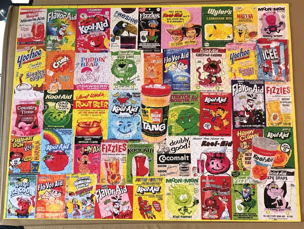 A collage of vintage retro drink mix packets and advertisements.