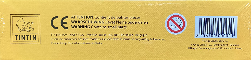 The yellow side panel featuring the Tintin logo, warning text, a barcode, and production information.
