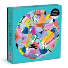 Abstract illustration with a circular collage of organic, brightly colored shapes and patterns.