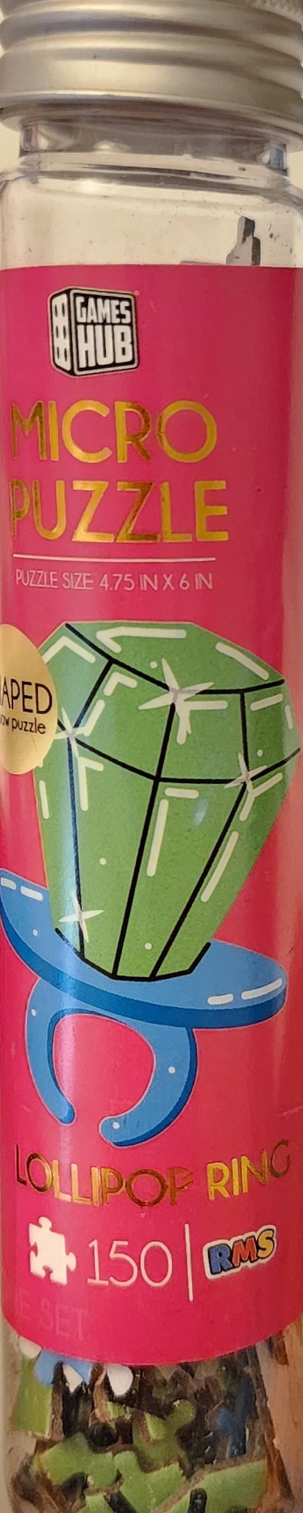A cartoon illustration of a green diamond-shaped lollipop ring on a bright pink background.