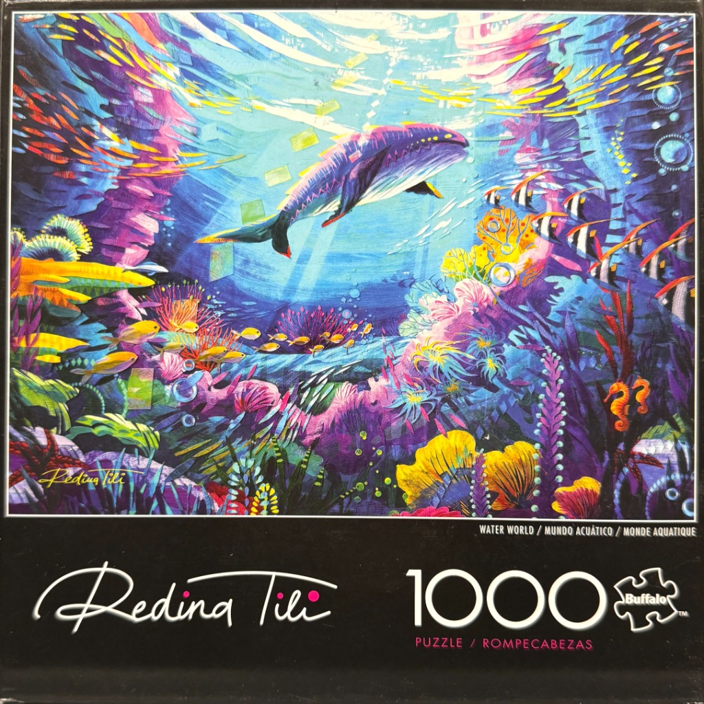 Colorful underwater scene featuring a whale swimming among coral reefs and schools of tropical fish.