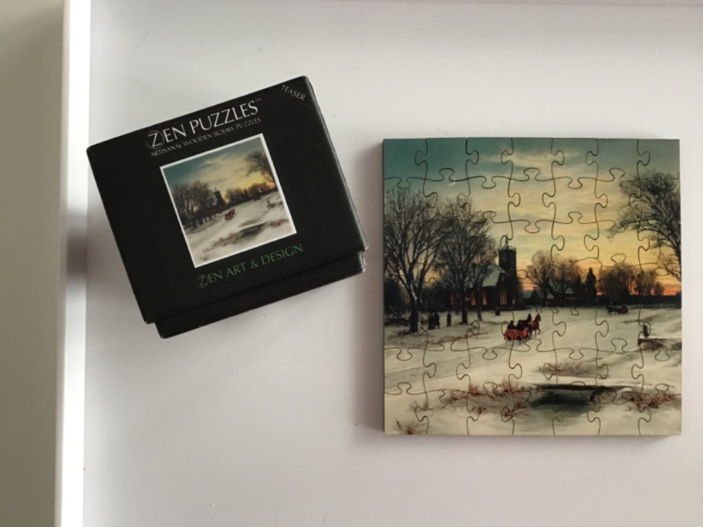 Oil painting of a winter village scene with a horse-drawn carriage at sunset.