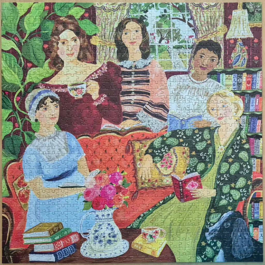 An illustration of five women gathered together in a cozy library setting, reading and drinking tea.