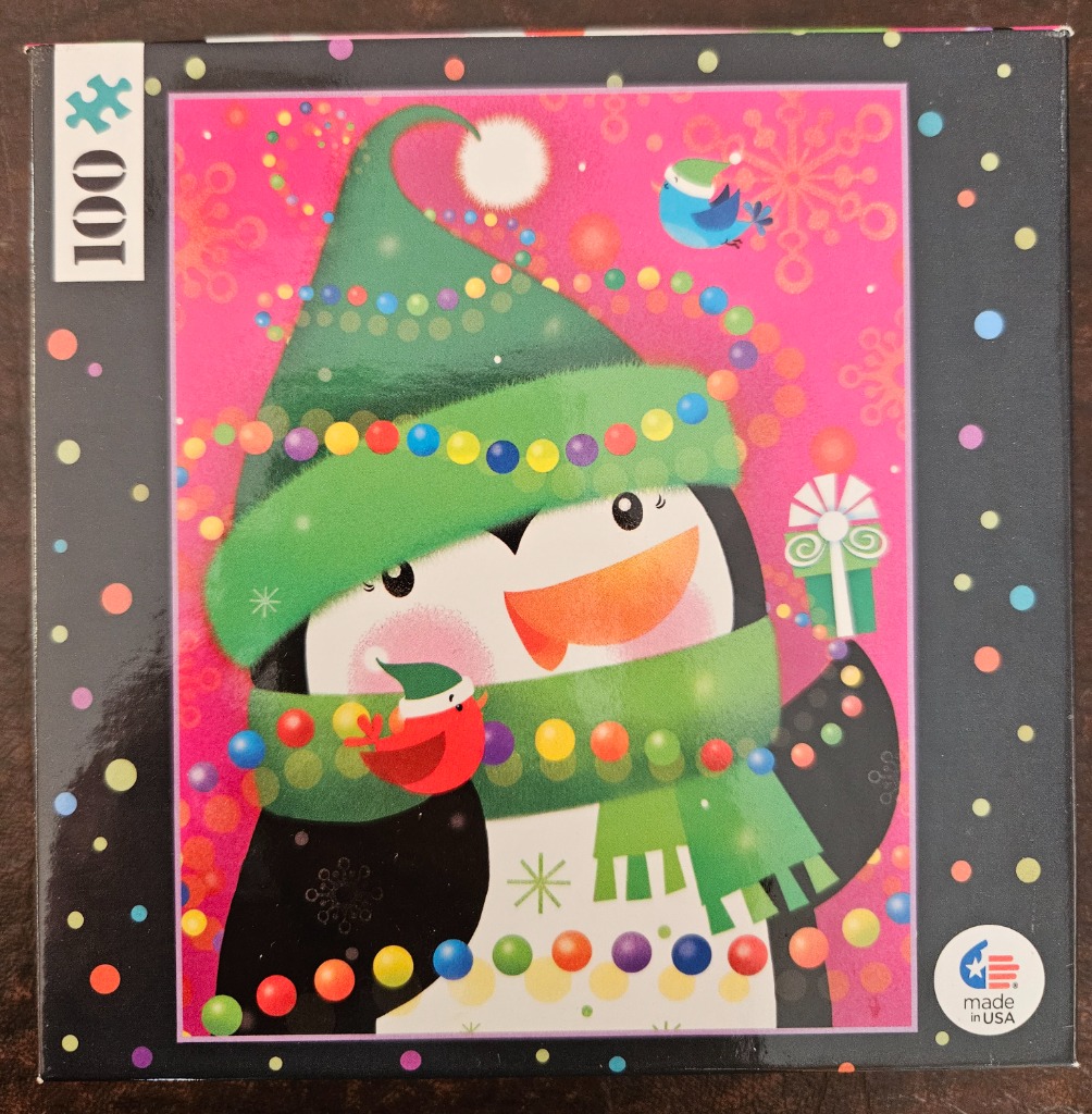 A whimsical illustration of a smiling penguin wearing a large green Santa hat and scarf, wrapped in festive fairy lights.