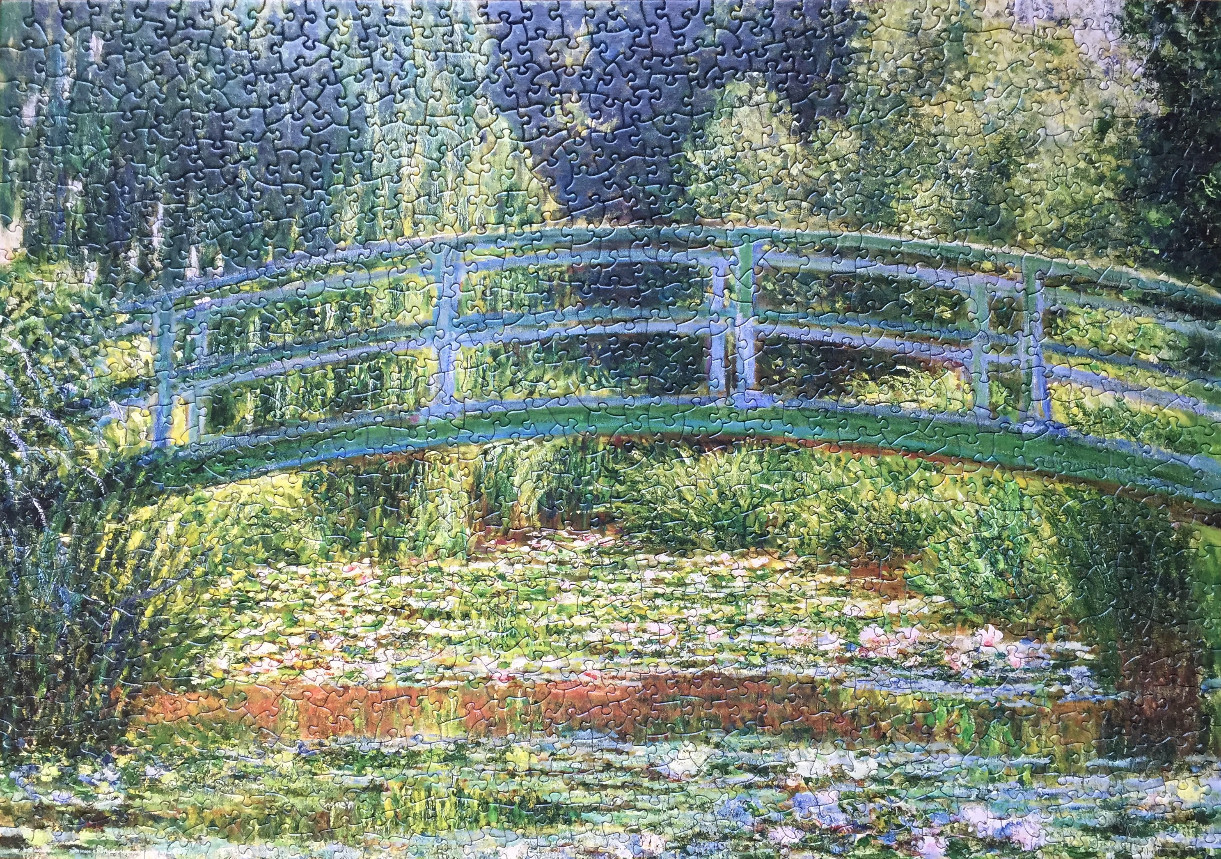 An impressionist painting of a green arched footbridge crossing a pond covered in water lilies.