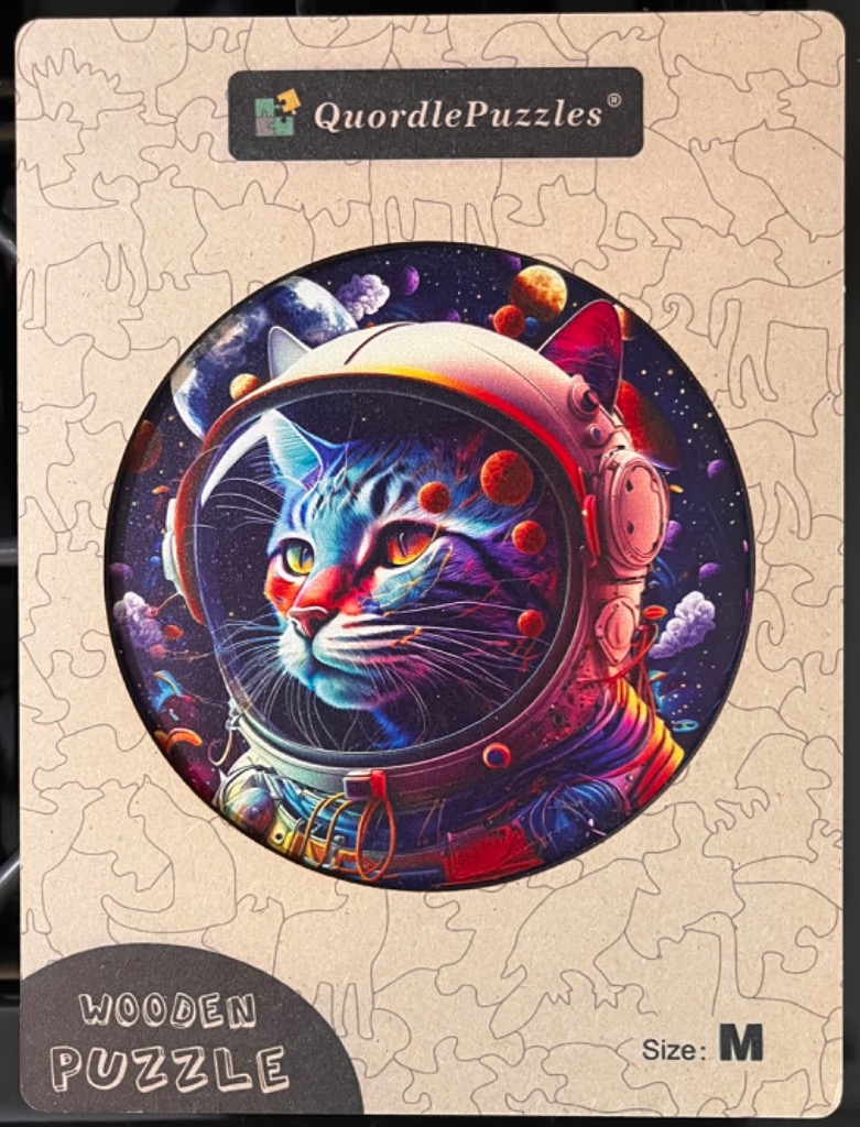 A circular digital illustration of a cat wearing a space helmet against a colorful, vibrant deep space nebula background.