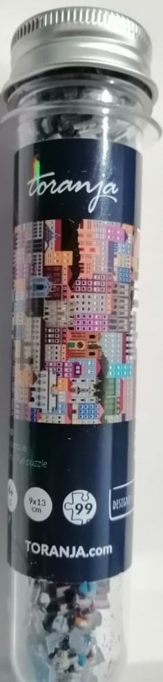 A cylindrical container featuring an illustration of colorful city buildings.