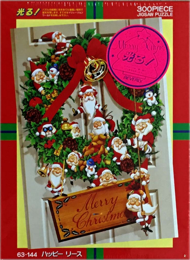 A whimsical Christmas wreath featuring many small Santa Claus characters hanging on a door.
