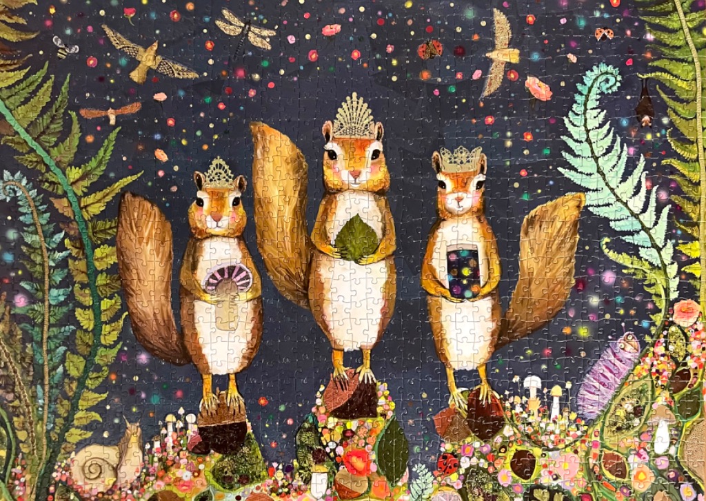 Three royal squirrels in a whimsical, starry forest scene.