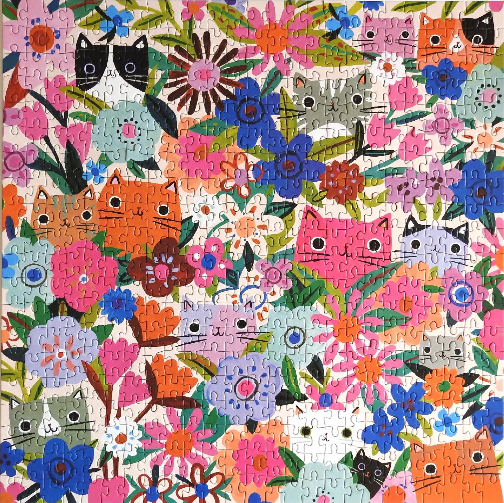 A whimsical illustration of many cats nestled among colorful, stylized flowers