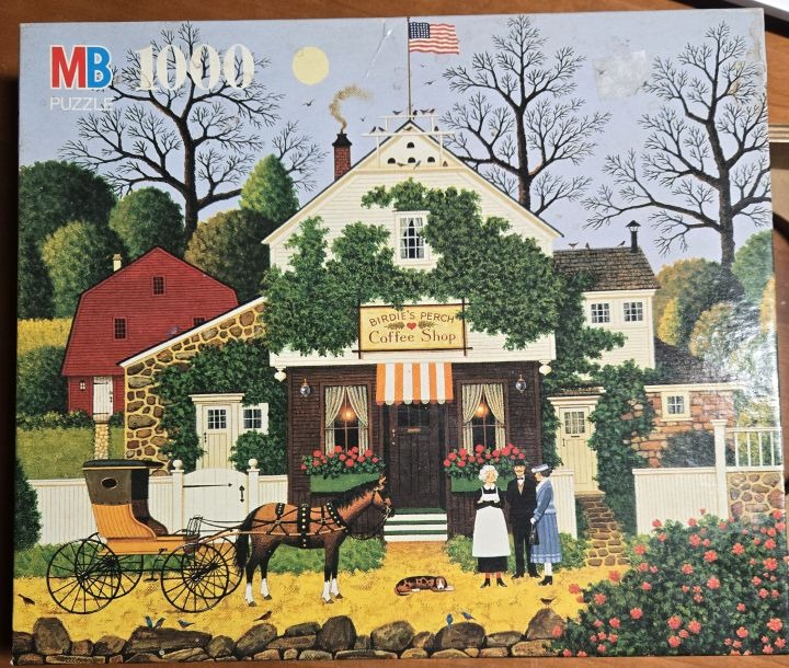 A pastoral painting of Birdie's Perch Coffee Shop featuring a horse-drawn carriage and figures in front.