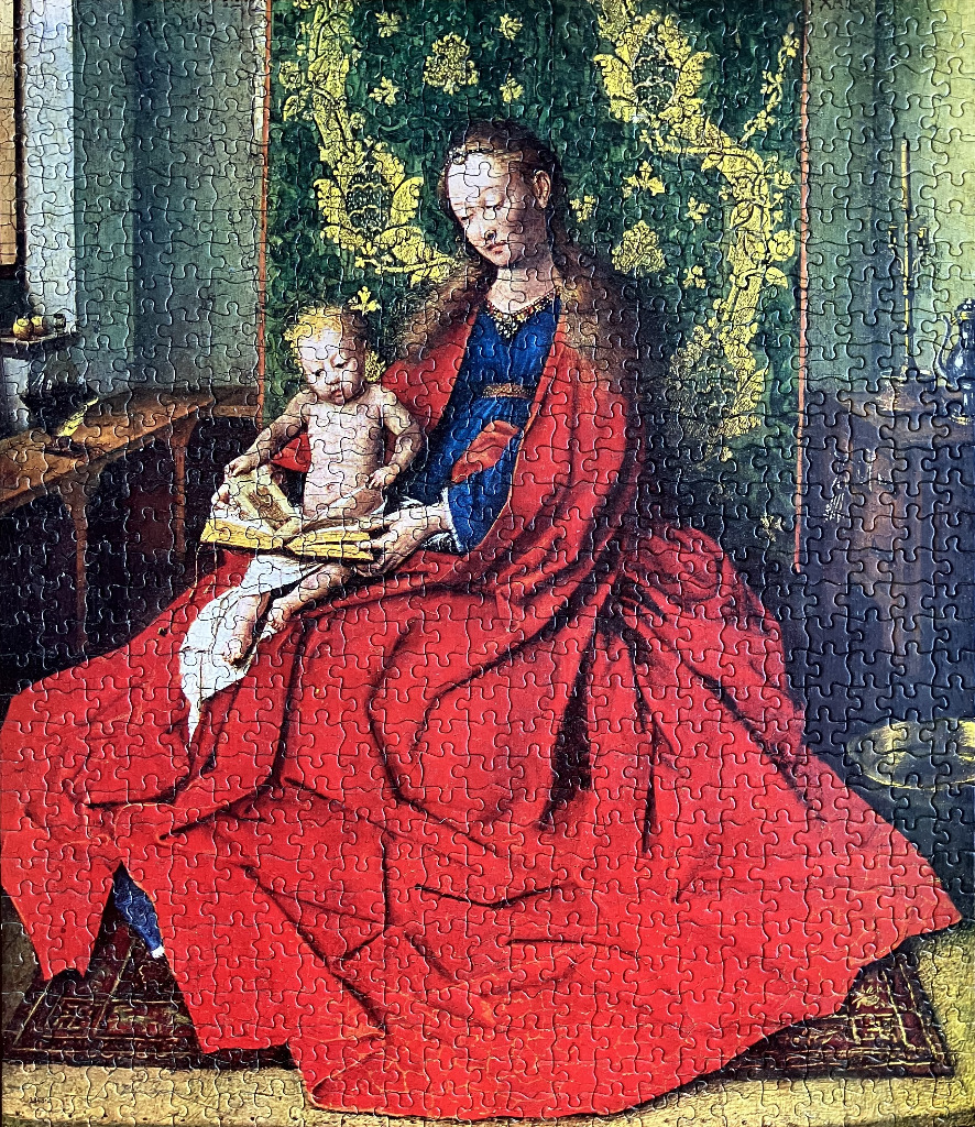 An oil painting of the Virgin Mary in a red robe holding the Christ child reading a book against a gold-patterned tapestry.