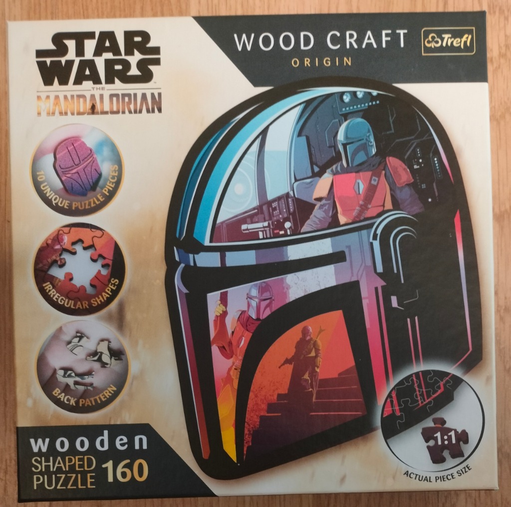 Illustration of the Mandalorian in his cockpit within a helmet-shaped frame