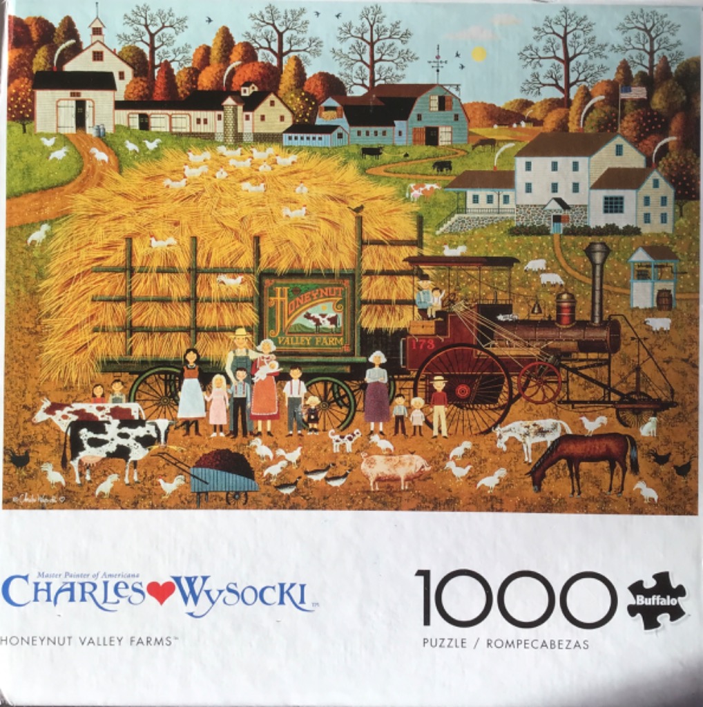 An illustration of a large farm scene with a steam-powered tractor pulling a wagon loaded with hay.