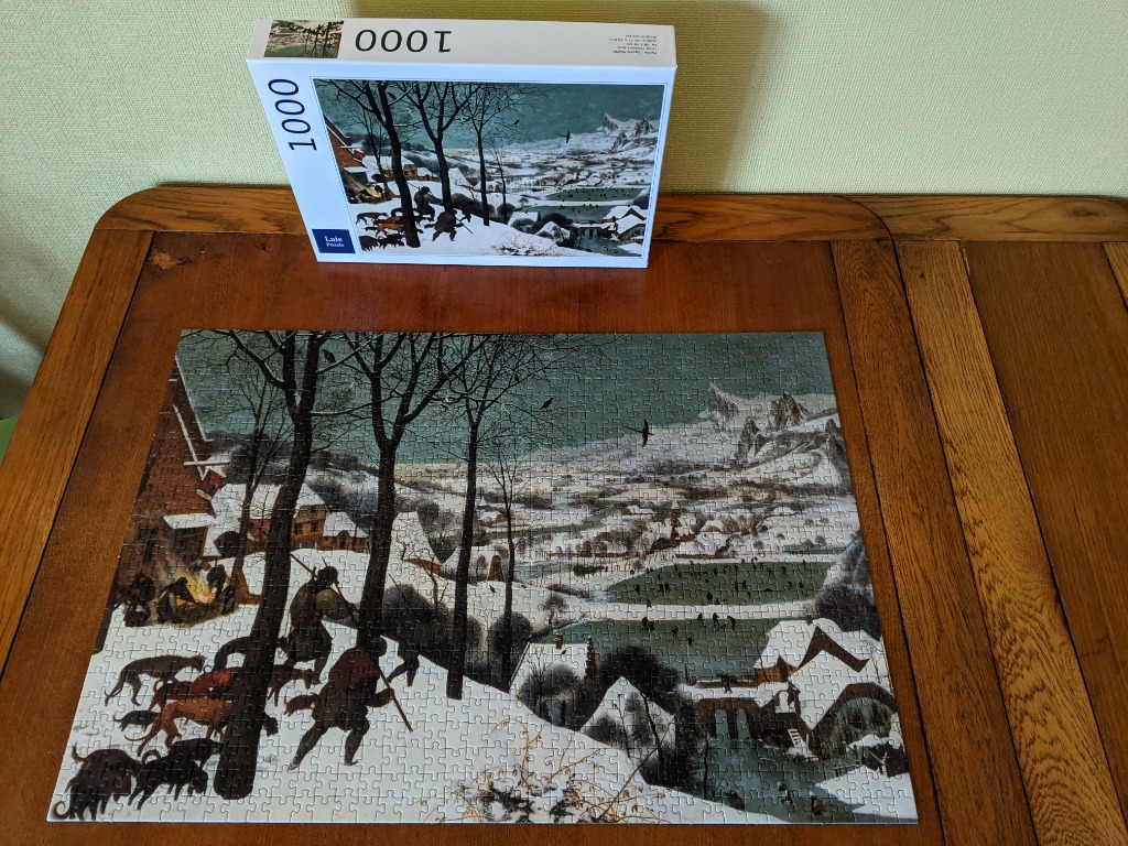 Hunters in the Snow