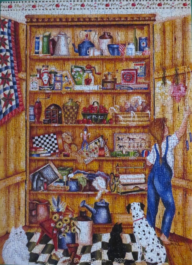 A cozy rustic pantry scene featuring a wooden cupboard filled with vintage kitchenware and a person reaching for a shelf.