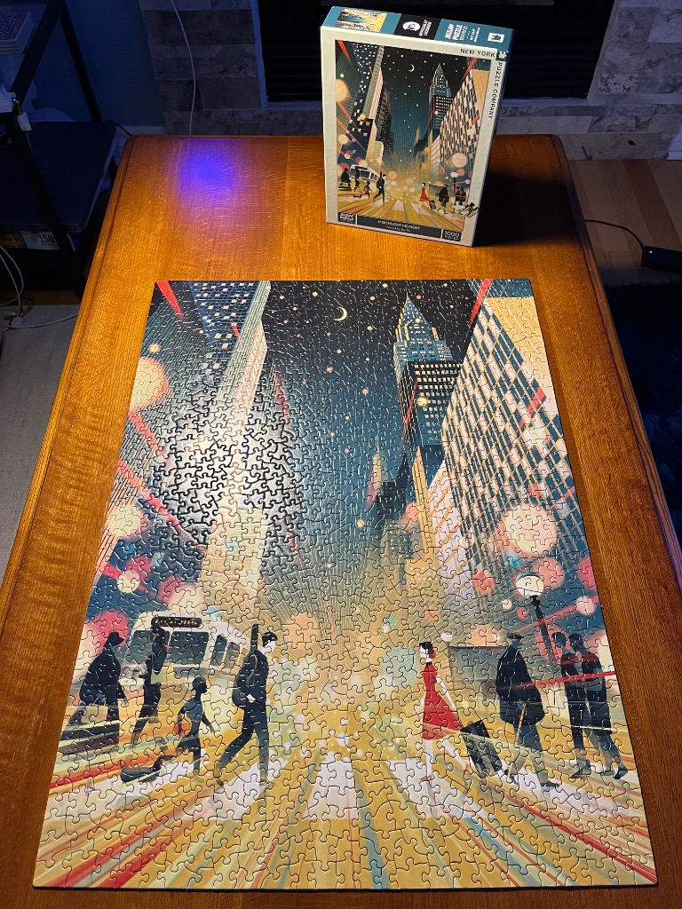 Illustration of a night cityscape in New York with people walking across a crosswalk under a crescent moon.
