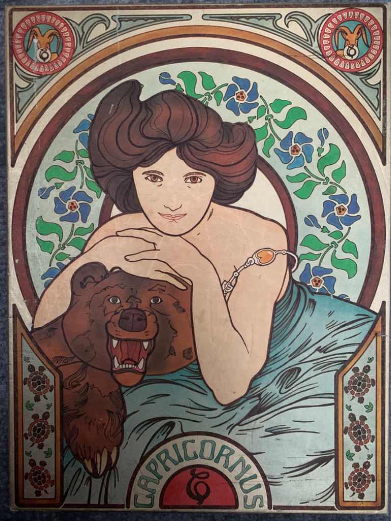 Art Nouveau style illustration of a woman and a bear representing the zodiac sign Capricornus.