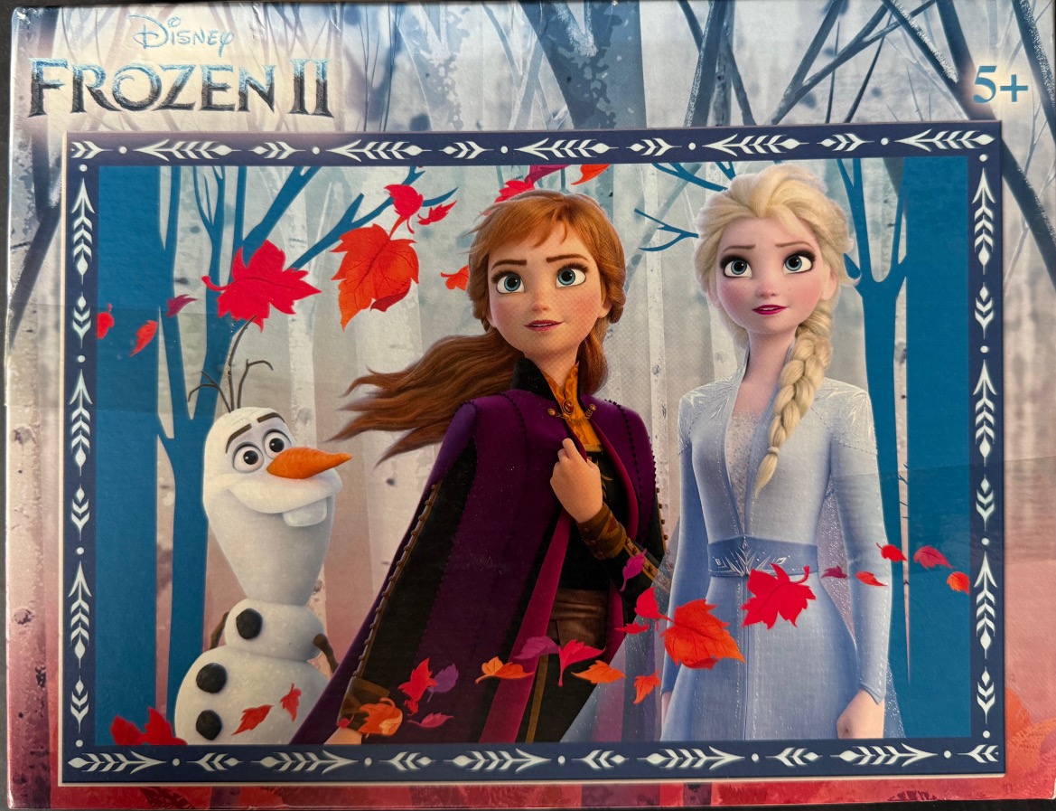 Anna, Elsa, and Olaf from Frozen 2 in an autumn forest scene
