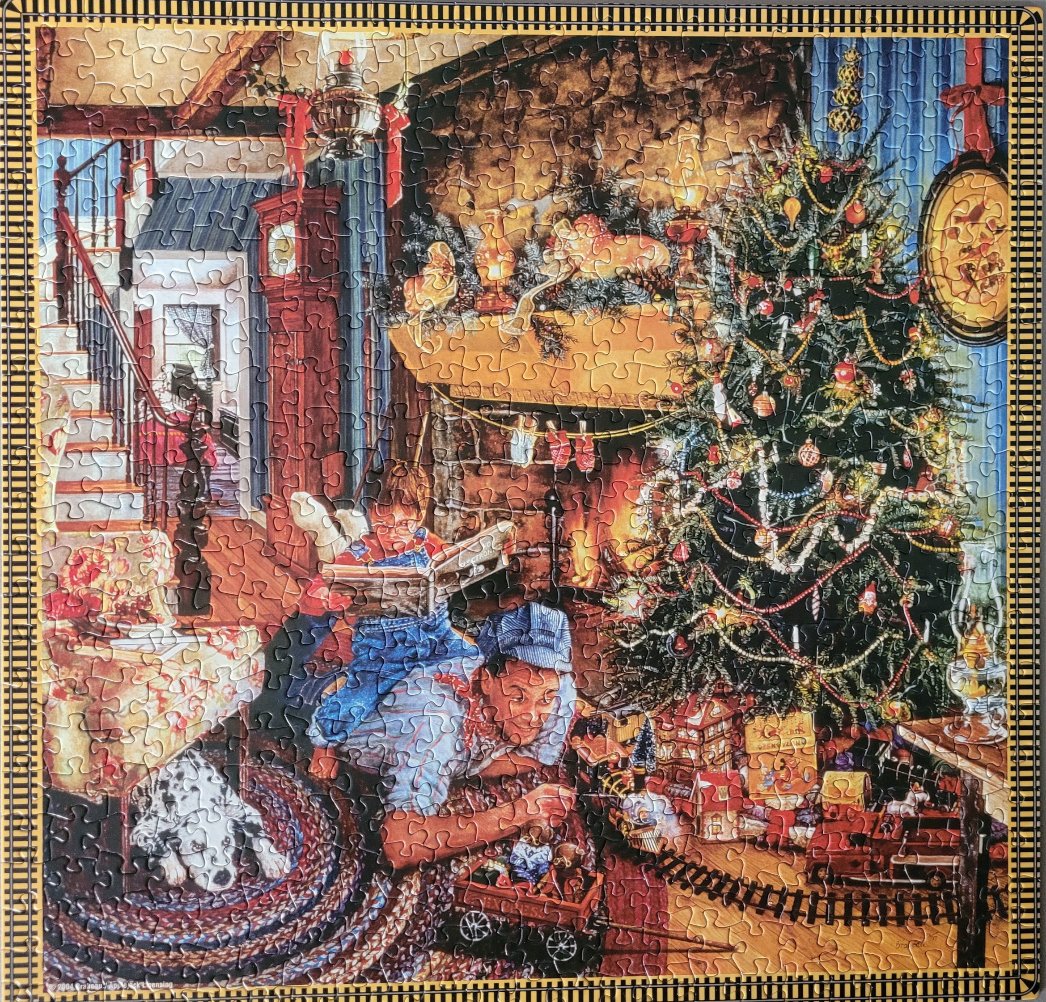 A cozy living room at Christmas with a father and child playing with a toy train near a fireplace and tree.