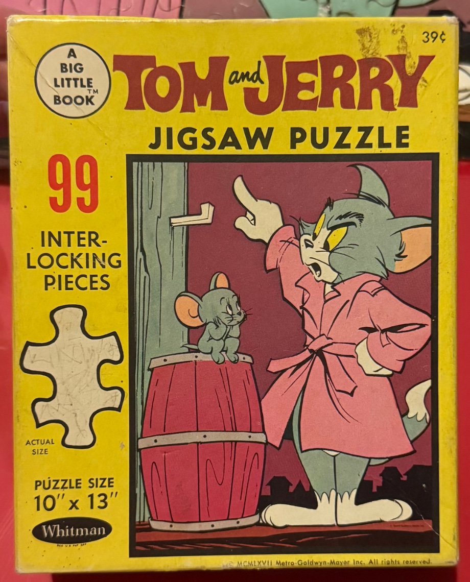 Vintage illustration of Tom the cat in a trench coat pointing at a wall next to Jerry the mouse sitting on a barrel.