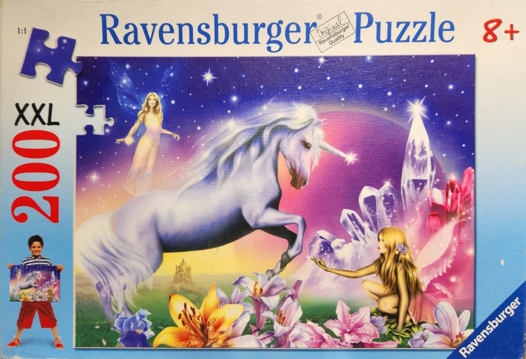 A fantasy illustration of a unicorn, two fairies, and large crystals against a sunset sky.