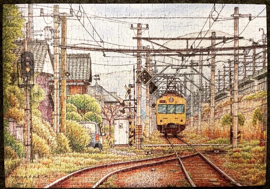 A detailed ink and watercolor illustration of a yellow train approaching on tracks through a quiet Japanese neighborhood.