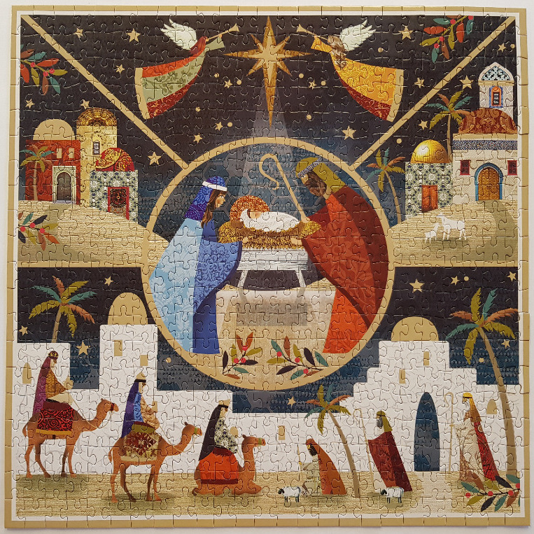 Stylized nativity illustration featuring the Holy Family in a circular medallion with the Three Kings arriving below.