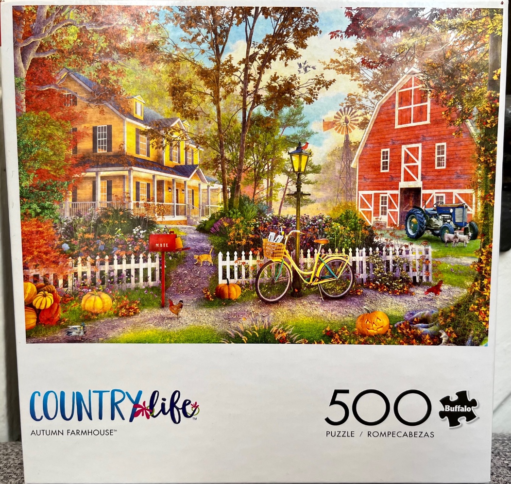 A peaceful autumn farm scene featuring a yellow farmhouse, red barn, bicycle, and pumpkins.