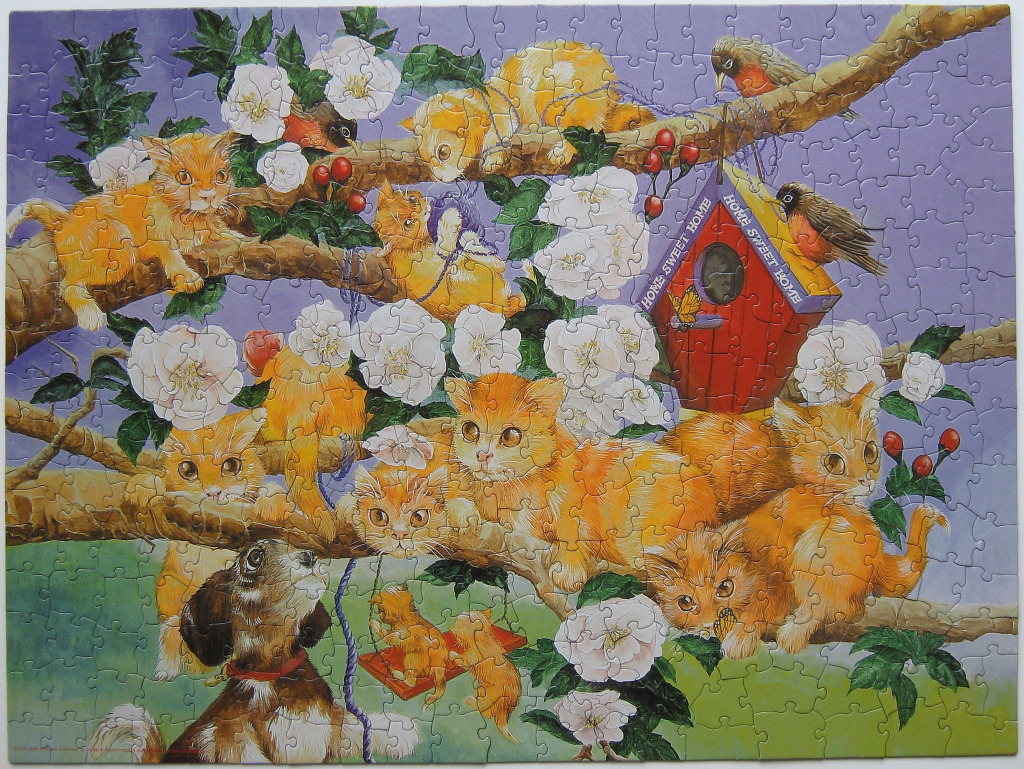 A whimsical illustration of many orange kittens playing in a tree with a birdhouse and a small dog below.