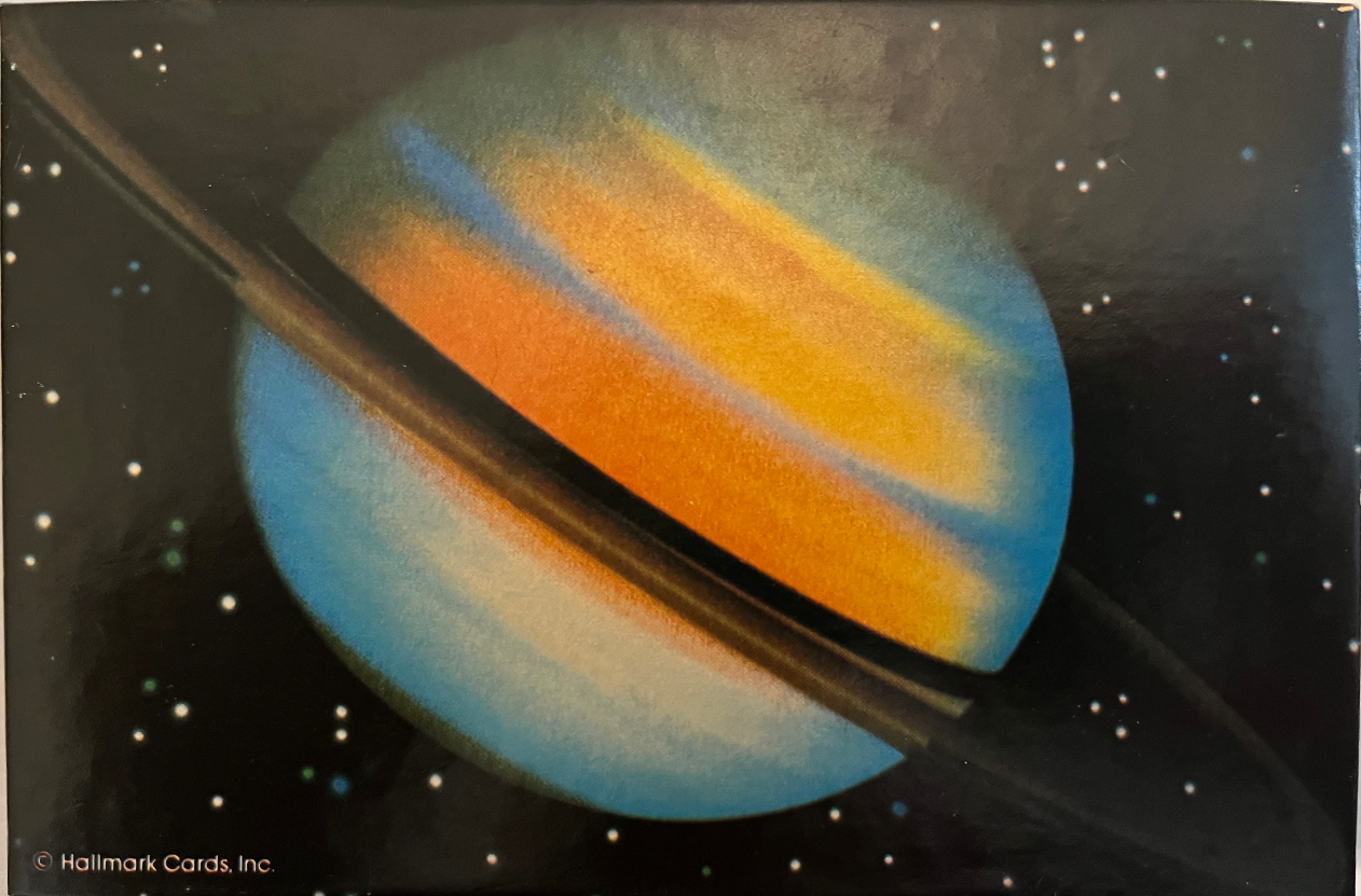 Stylized illustration of a ringed planet in deep space with glowing orange and blue bands.