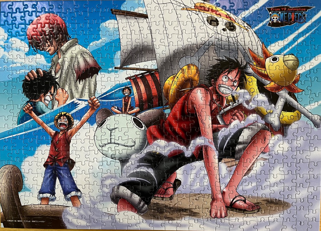 Anime illustration featuring Monkey D. Luffy and Shanks from One Piece with the Going Merry ship.