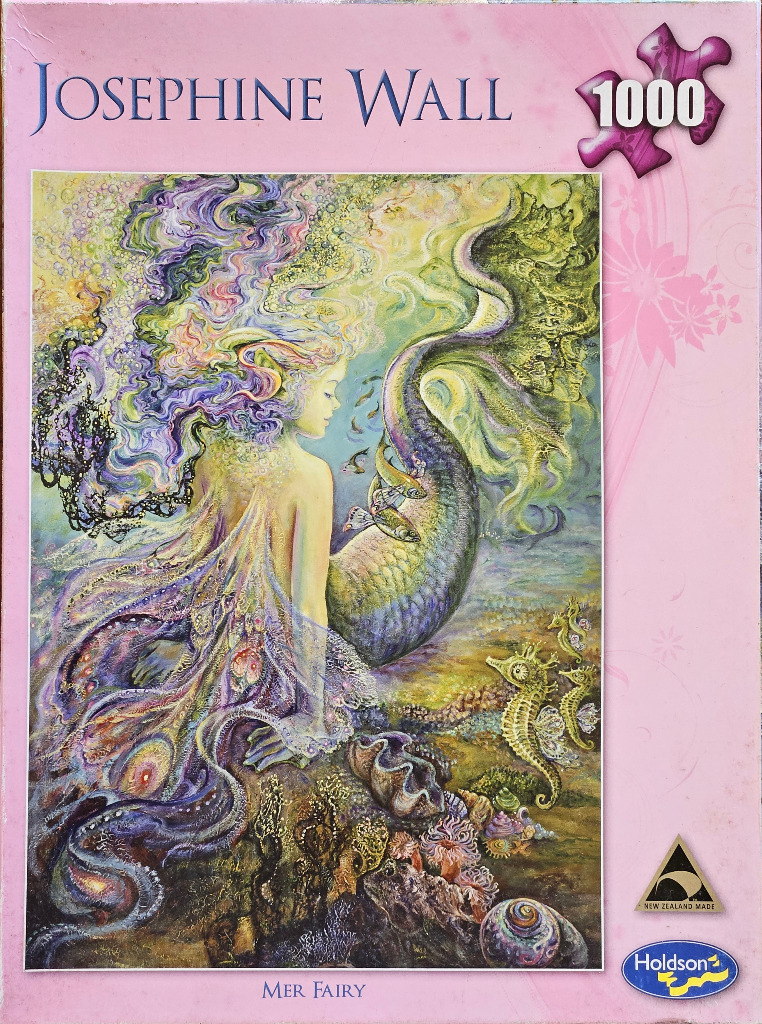 Fantasy illustration of a mermaid with ethereal, flowing hair and a sea-life themed tail, surrounded by ocean elements.
