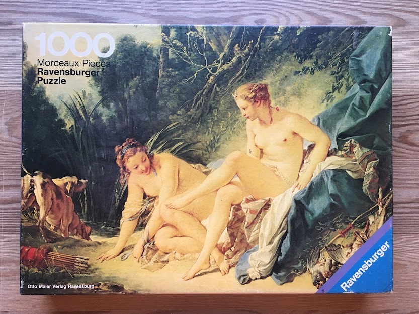 A classical oil painting of Diana and a nymph bathing by a forest stream with hunting hounds.