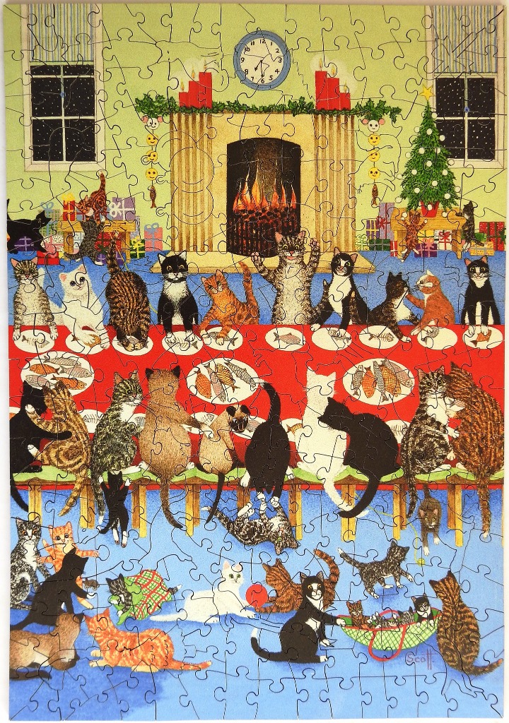 An illustration of many cats gathering for a holiday dinner in front of a fireplace.