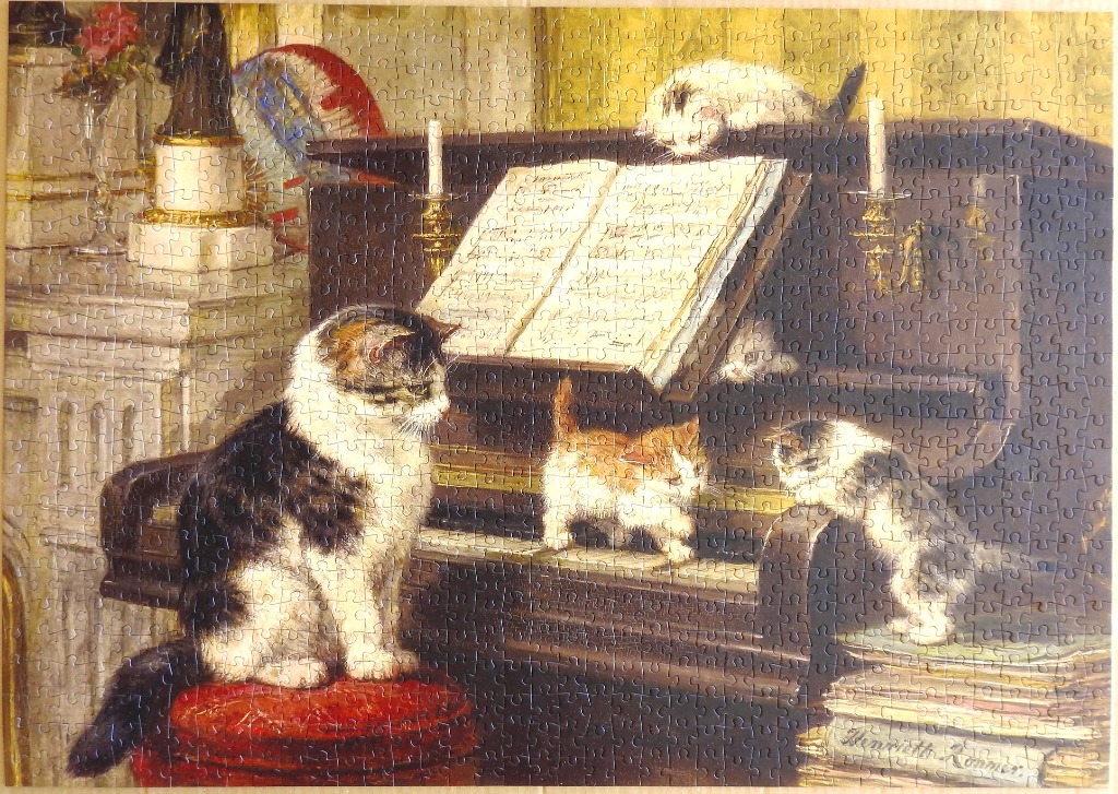 An oil painting of a mother cat and her three kittens gathered around an upright piano.