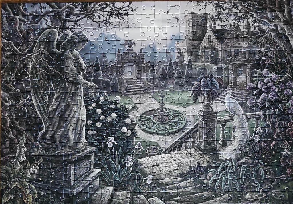 Gothic garden scene with angel statue, fountain, and white peacock.