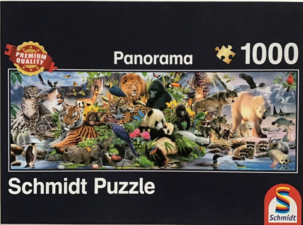 A panoramic montage of various wild animals from different habitats including a tiger, panda, polar bear, and gorilla.